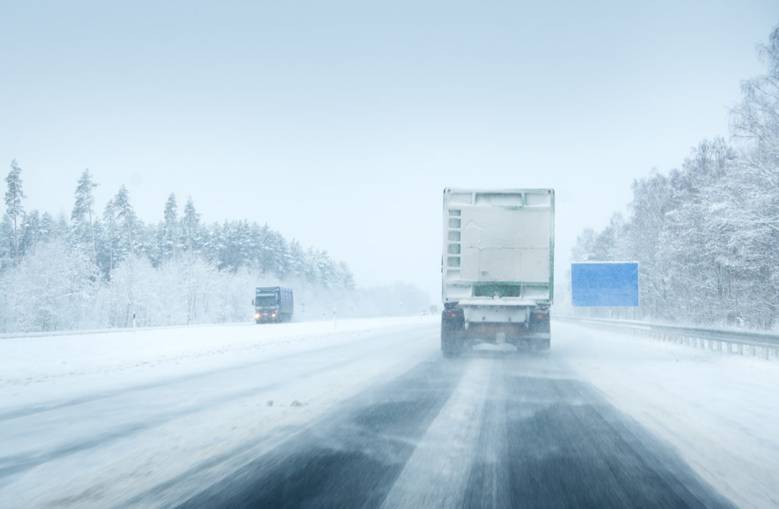 bigstock Trucks moving on a motorway 110968442 e1552850156369