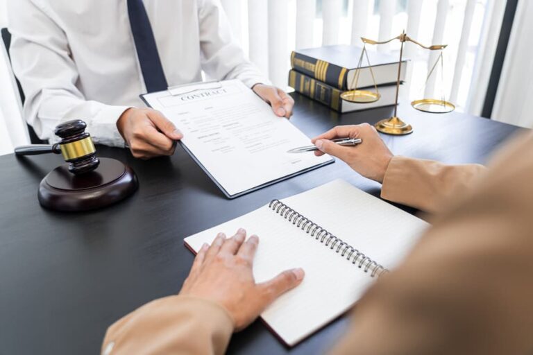Lawyer or judge presenting a client with contract documents, representing law and legal services.